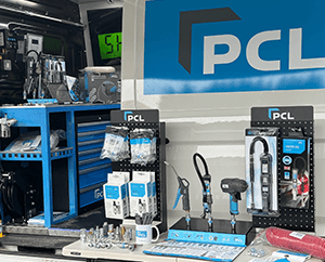 PCL Products displayed on table next to PCL Demo Van